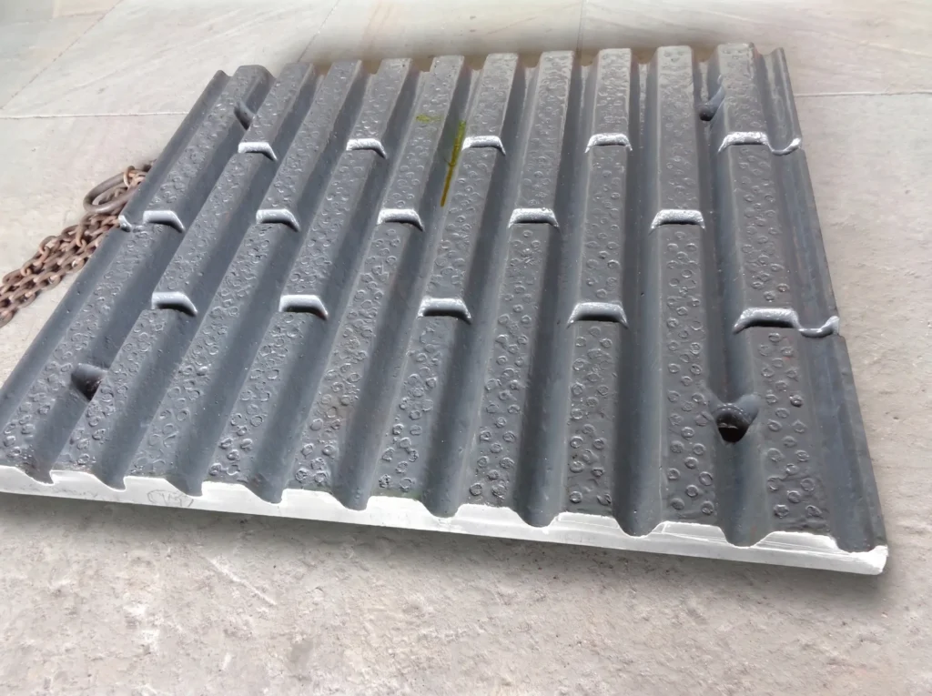 minevant-jaw-plate-manganese-tic-inserts MineVant jaw plate with manganese steel and TiC inserts for improved wear resistance and longer service life.